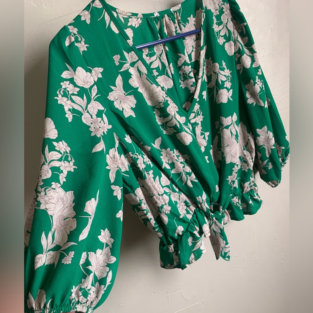 Green floral cropped blouse.